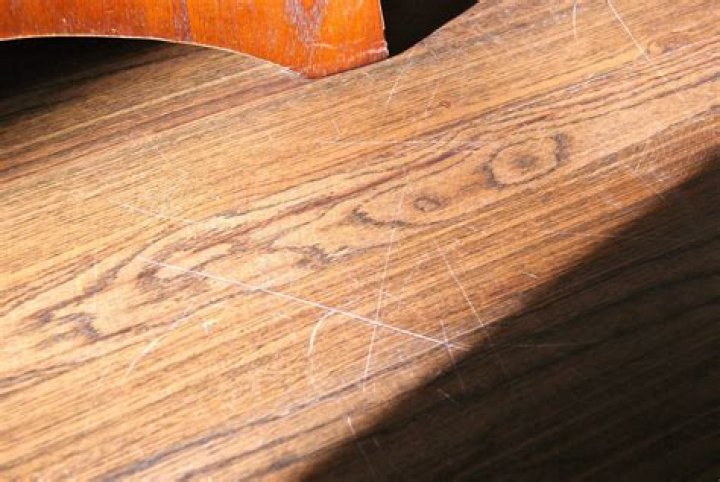 Are scratches on wood floors normal wear and tear?