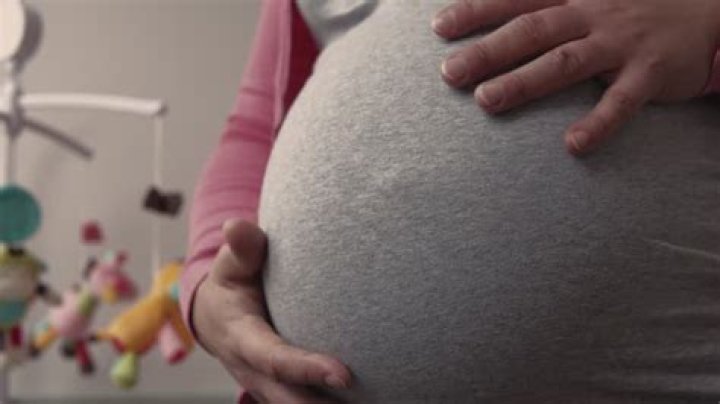 Can babies feel when you rub your belly?