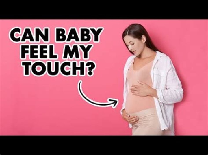 Can my baby feel when I rub my stomach?