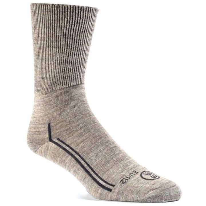 Can ticks crawl under socks?