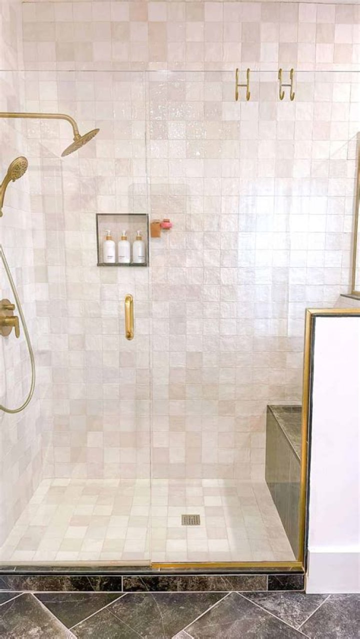 Can you tile over Greenboard in a shower?