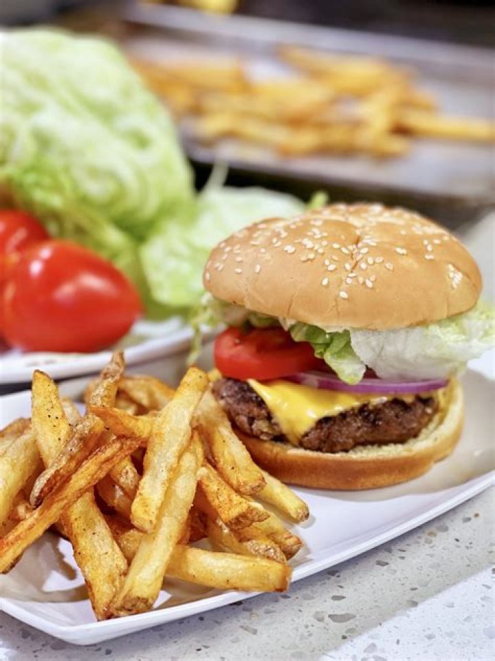 Do Beaches and Cream burgers come with fries?