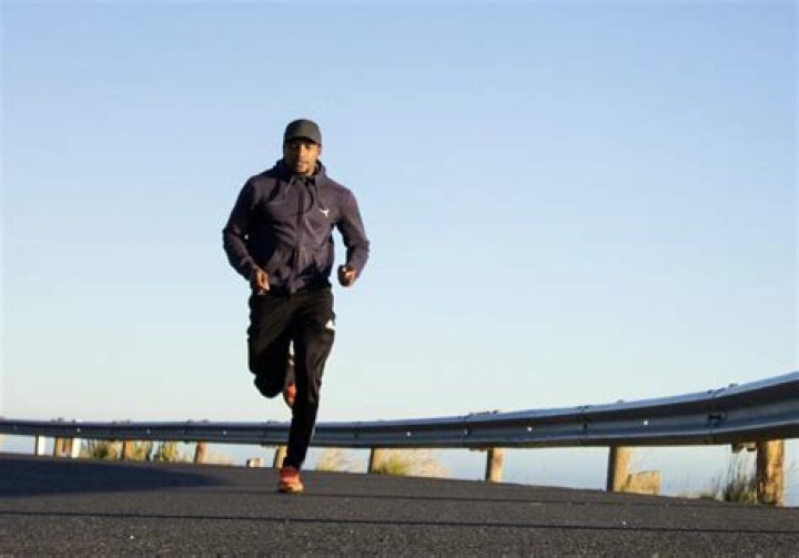 Does walking tone your legs more than running?