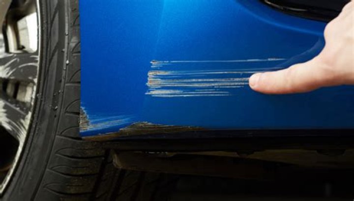 Does waxing a car prevent scratches?