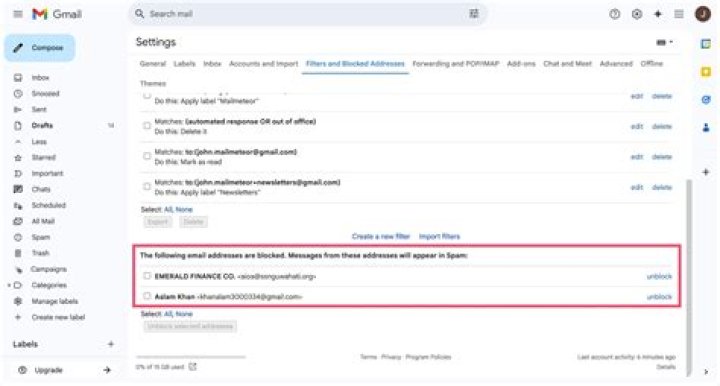 How do I automatically delete emails from blocked senders on my iPhone?
