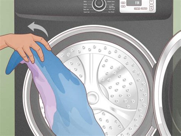 How do I get rid of the moldy smell in my washing machine?