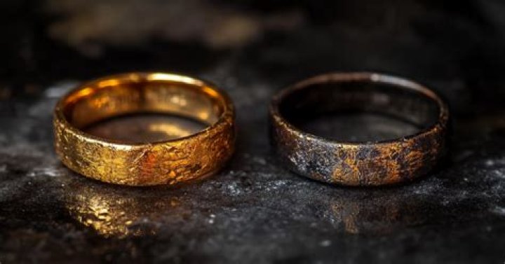 How do you clean Discoloured gold jewelry?