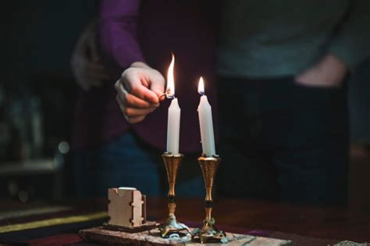 How many candles does it take to light a room?