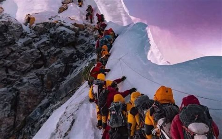 How many people climb Everest every year?