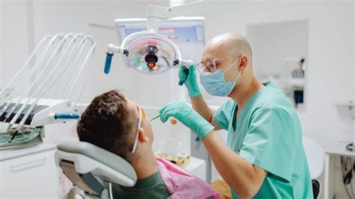 Is a dentist a physician?
