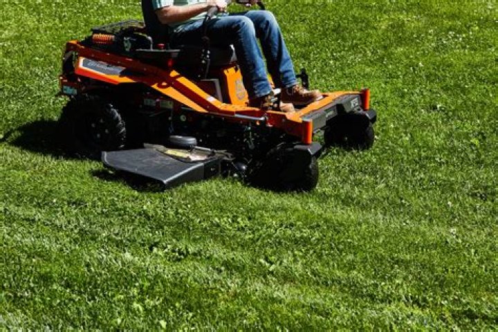 Is it bad to turn a lawn mower on its side?