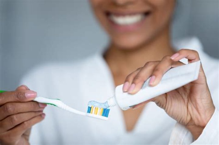 Is it better to brush your teeth without toothpaste?