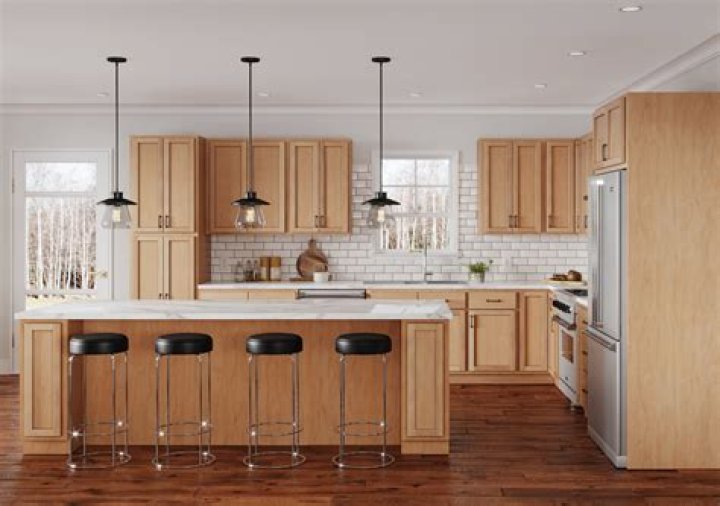 Is maple or cherry better for kitchen cabinets?