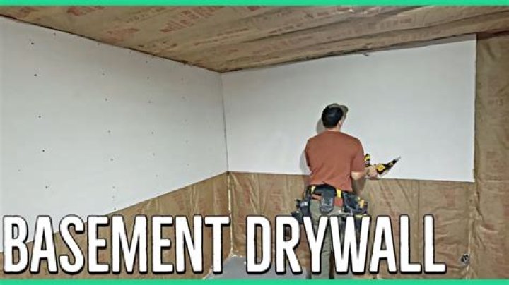 Should I put plastic behind drywall in a basement?