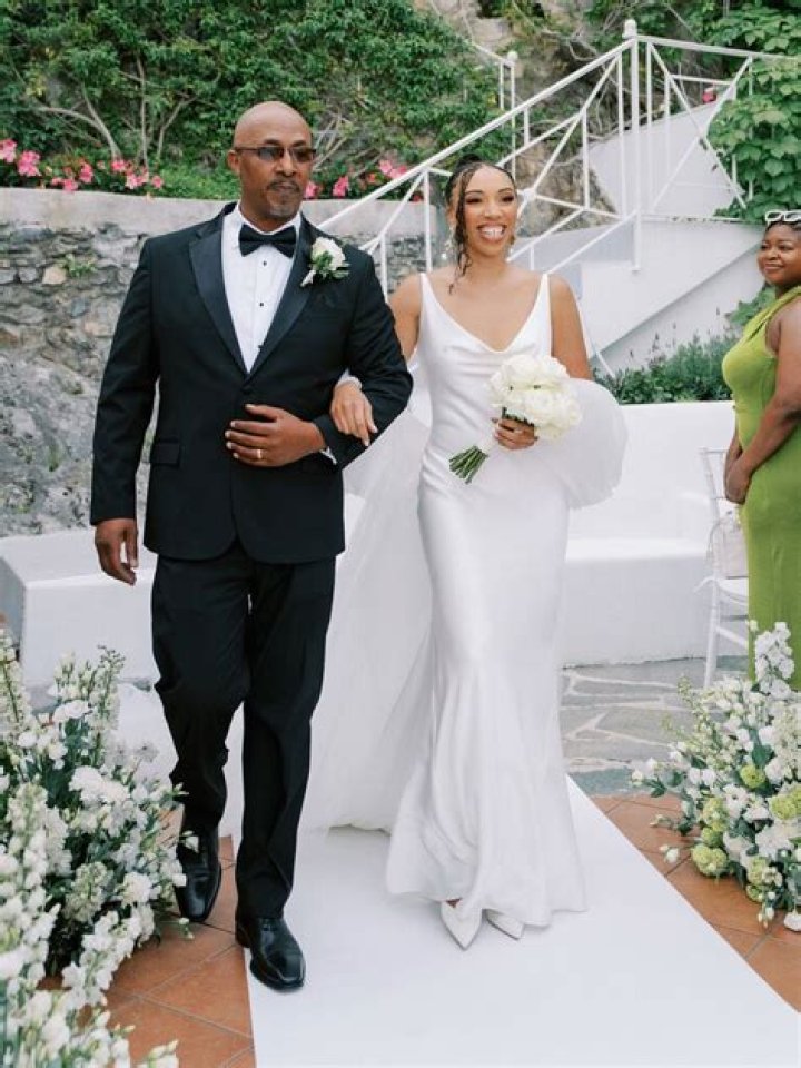 What color does the father of the bride wear?