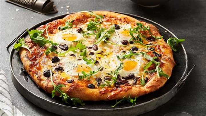 What culture puts egg on pizza?