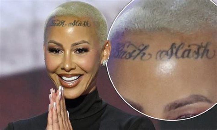 What does Amber Rose forehead tattoo say?