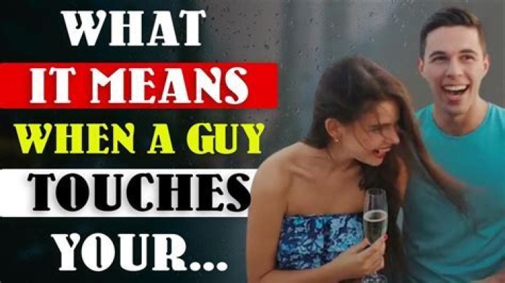What does it mean when a guy touches his hair?