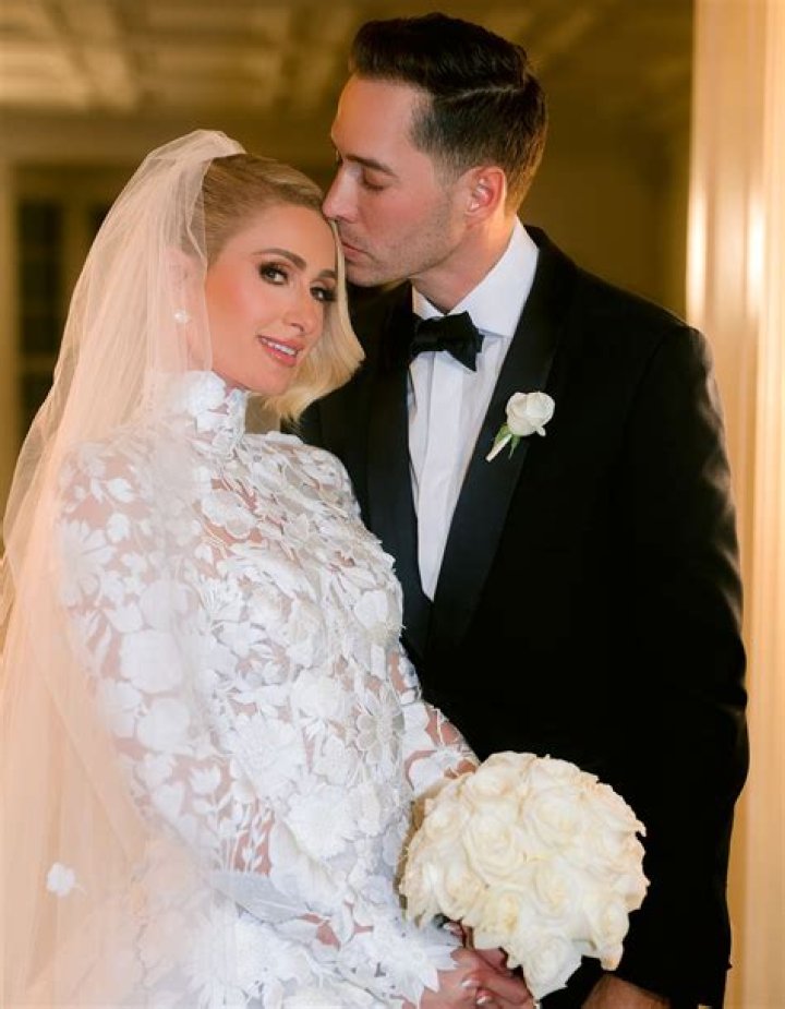 What does Paris Hilton husband do for a living?