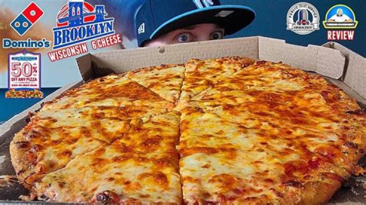 What is the yellow stuff on Domino's Pizza?