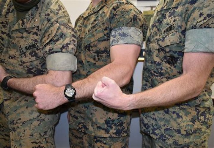 When did Marines stop rolling sleeves?