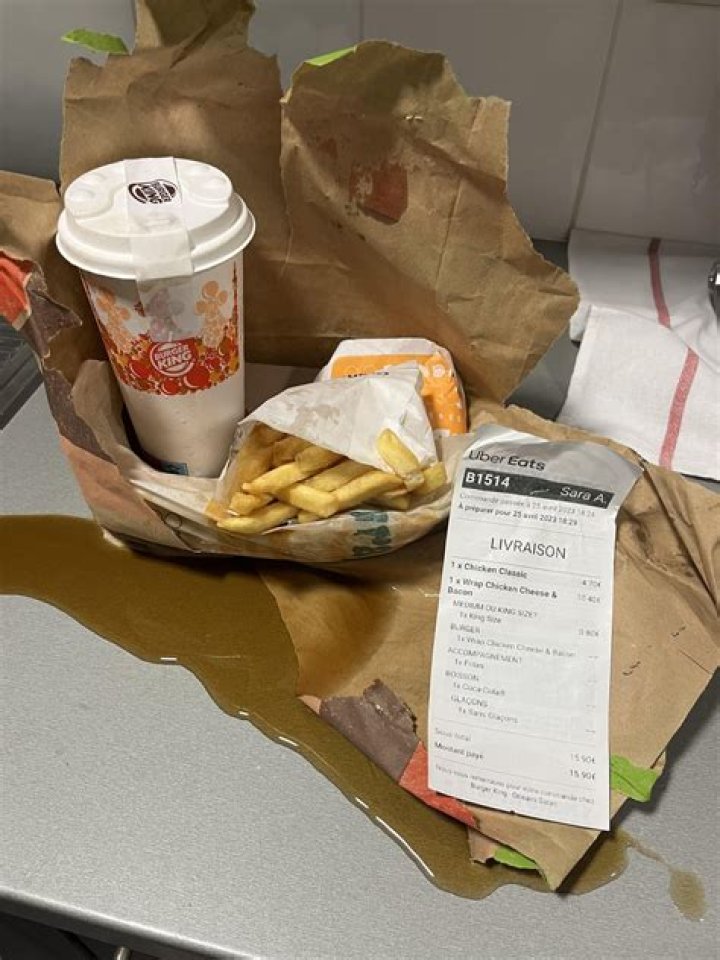 Who gets the delivery fee on Uber Eats?