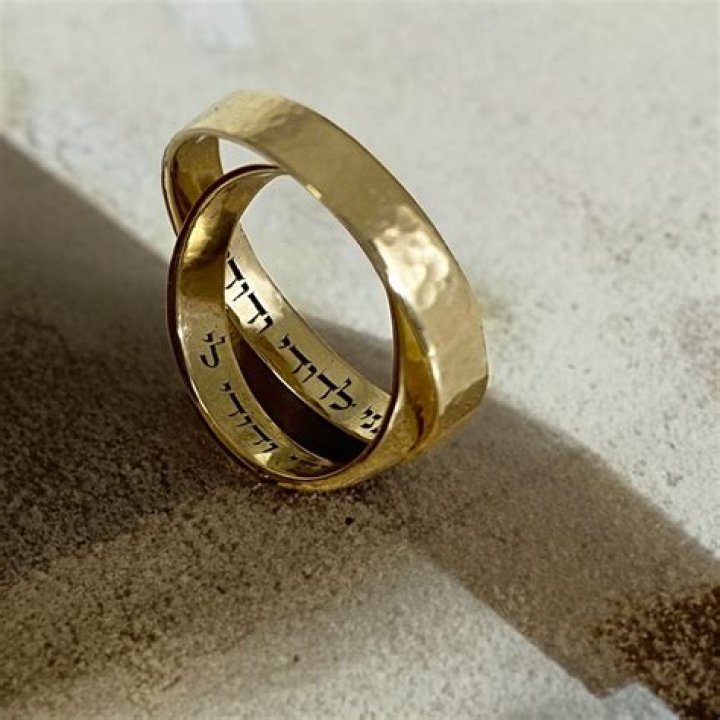 Who holds the bride's ring?