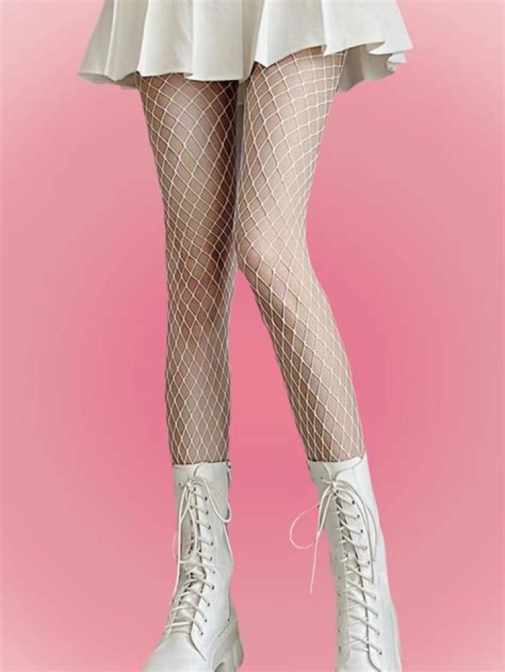 Why do performers wear nude fishnet stockings?