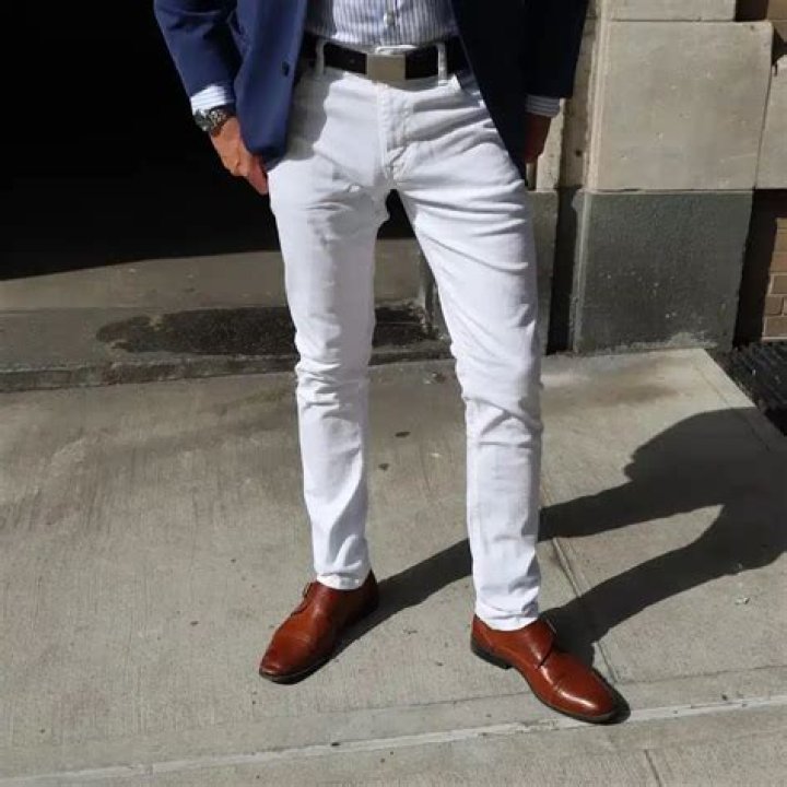 Why do polo players wear white pants?