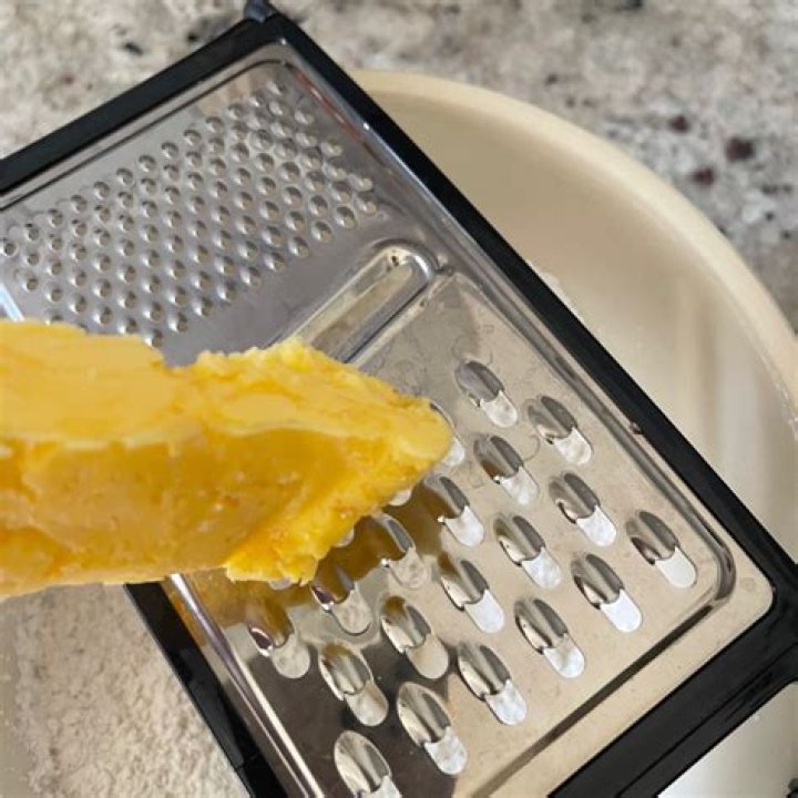 Why do you grate frozen butter?