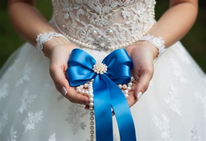 Why does a bride wear something blue?