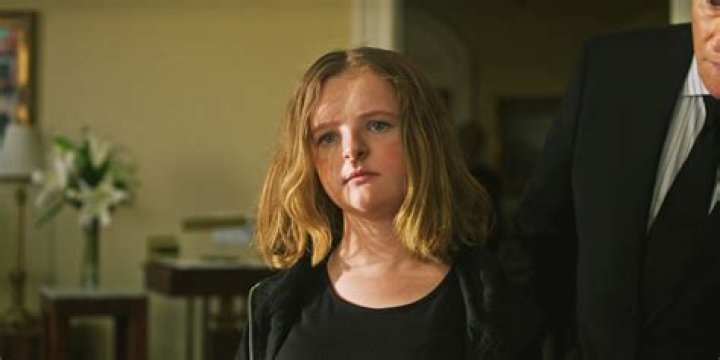 Why does Charlie always click her tongue in Hereditary?